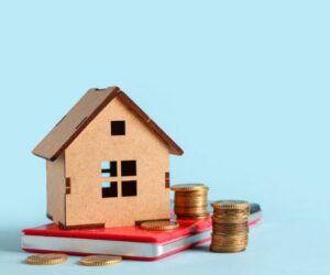 house with money around it