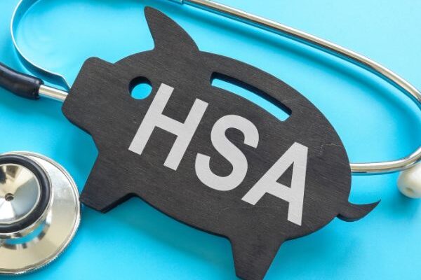 piggy bank and stethoscope