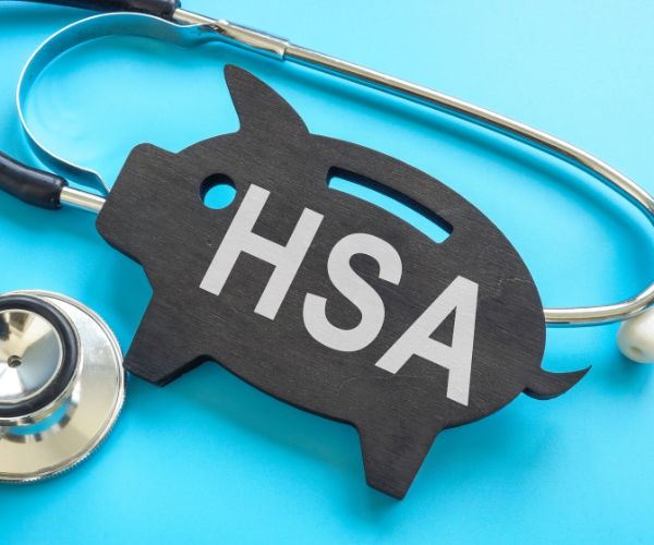 piggy bank and stethoscope